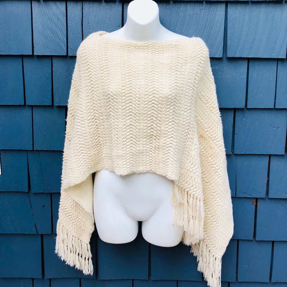 Boutique cream-colored poncho
